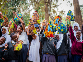 The main photograph (above), supplied by Tanzanian aid worker Alice Kostrzewa shows a group of schoolchildren in Arusha, the United Republic of Tanzania, proudy displaying their personal hygiene kits, locally made from templates provided by Yorkits. 